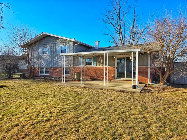 a house view with a garden space
