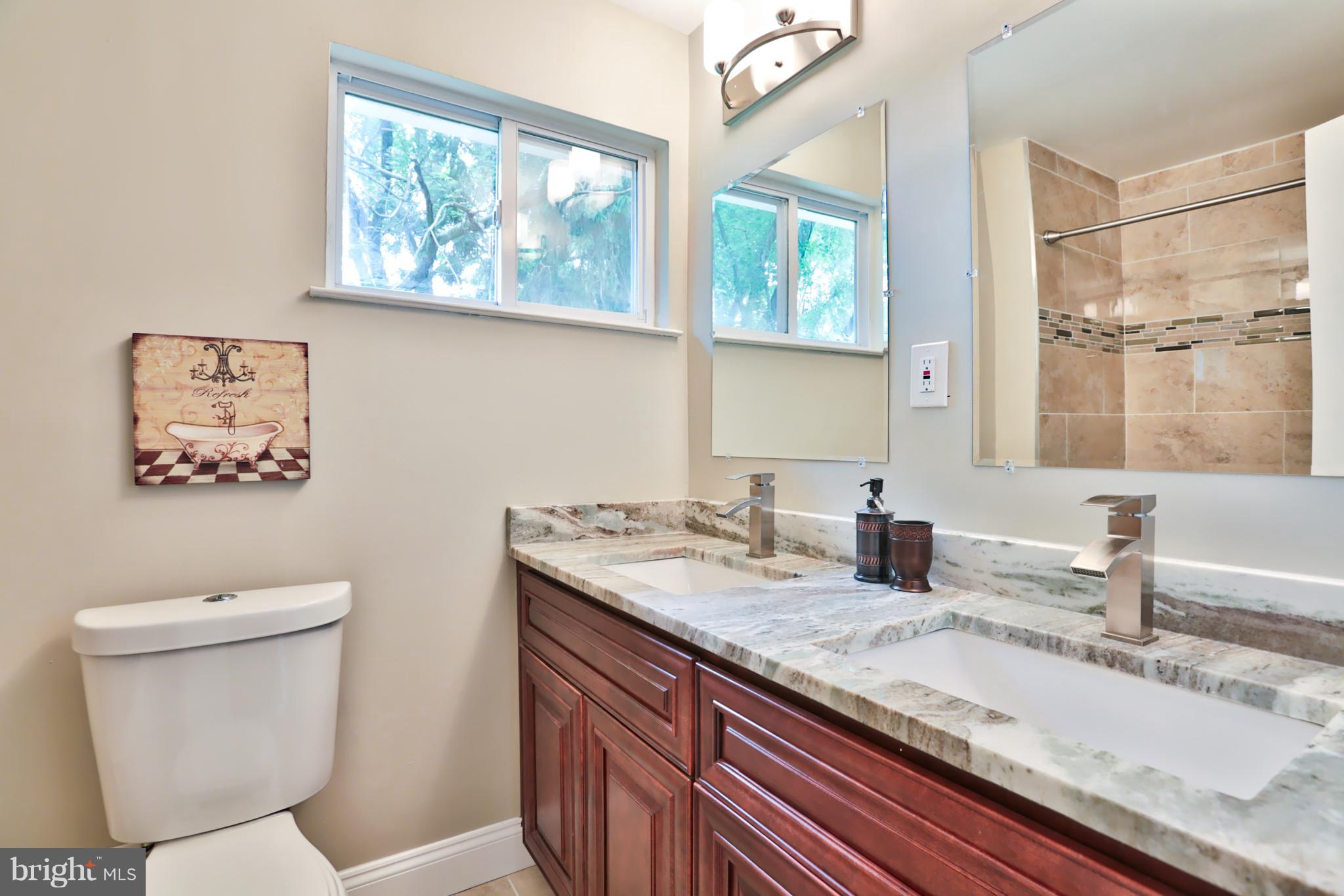 3919 Tiverton Road Randallstown, MD 21133 - Photo 17 of 26 Custom Tile And Sleek Finishes