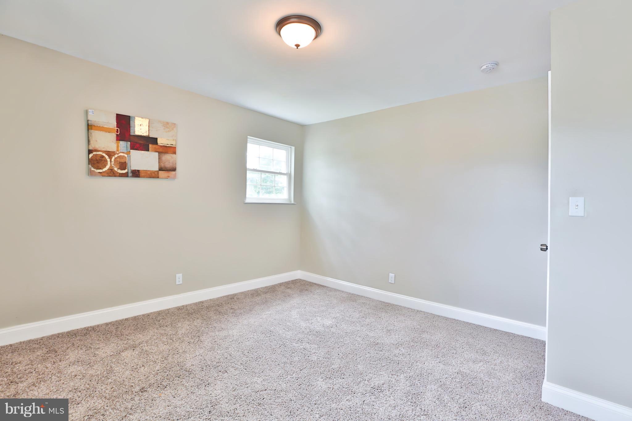 3919 Tiverton Road Randallstown, MD 21133 - Photo 20 of 26 Warm And Inviting Bedroom