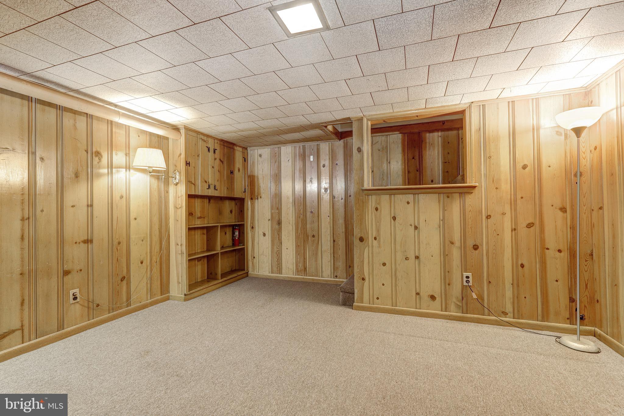 70 Berkshire Road Essex, MD 21221 - Photo 20 of 30 familyroom lower level w/built-ins
