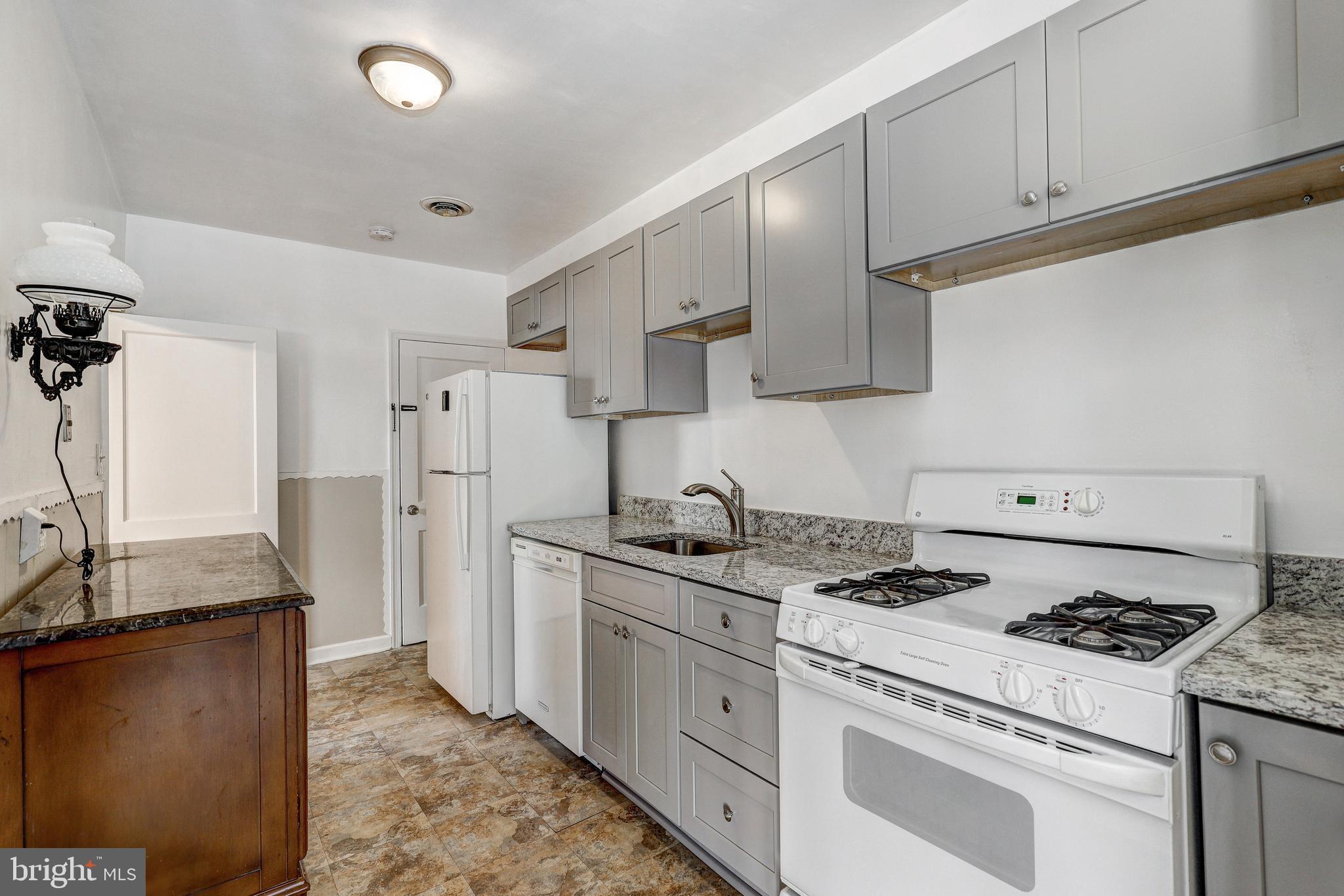 70 Berkshire Road Essex, MD 21221 - Photo 10 of 30 new gas stove