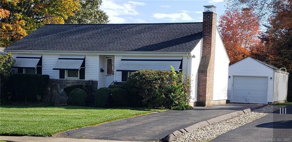 342 Brimfield Road Wethersfield, CT 06109 - Photo 1 of 1 a front view of a house with garden