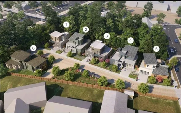 an aerial view of a house with a swimming pool