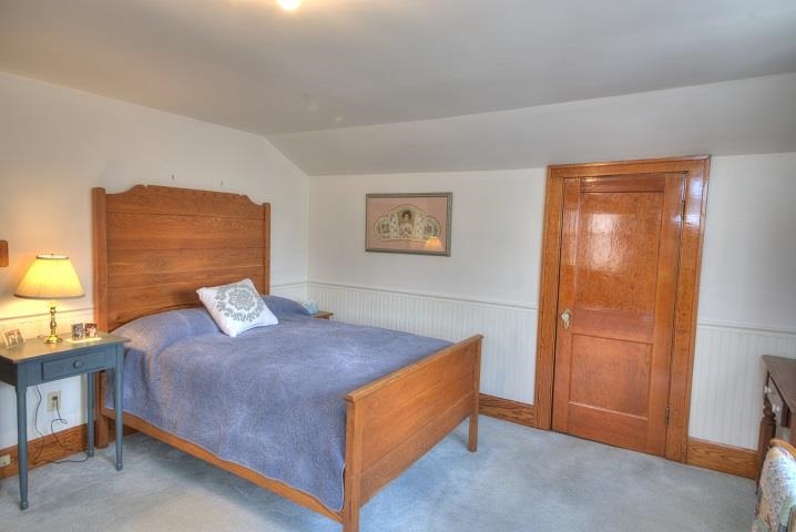 1310 New Hope Road Staunton, VA 24401 - Photo 20 of 62 a bedroom with a bed and a lamp on the dresser