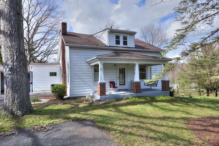 1310 New Hope Road Staunton, VA 24401 - Photo 32 of 62 a view of a house with a yard porch and sitting area