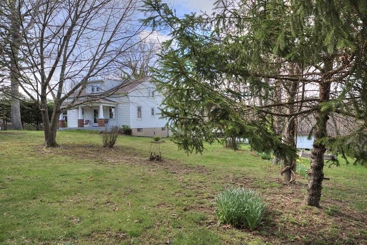 1310 New Hope Road Staunton, VA 24401 - Photo 37 of 62 a view of a house with a yard