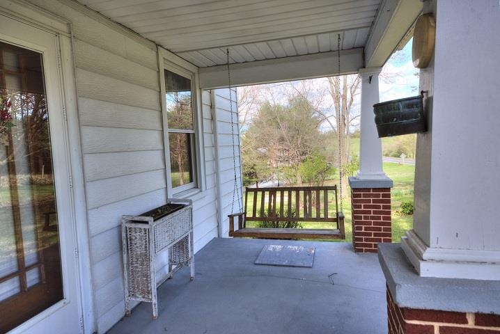 1310 New Hope Road Staunton, VA 24401 - Photo 4 of 62 a view of a porch with furniture