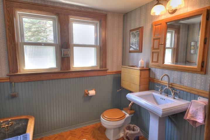 1310 New Hope Road Staunton, VA 24401 - Photo 51 of 62 a bathroom with a sink a toilet and a window