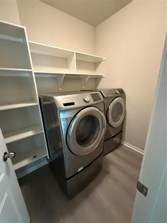 a utility room with dryer and washer
