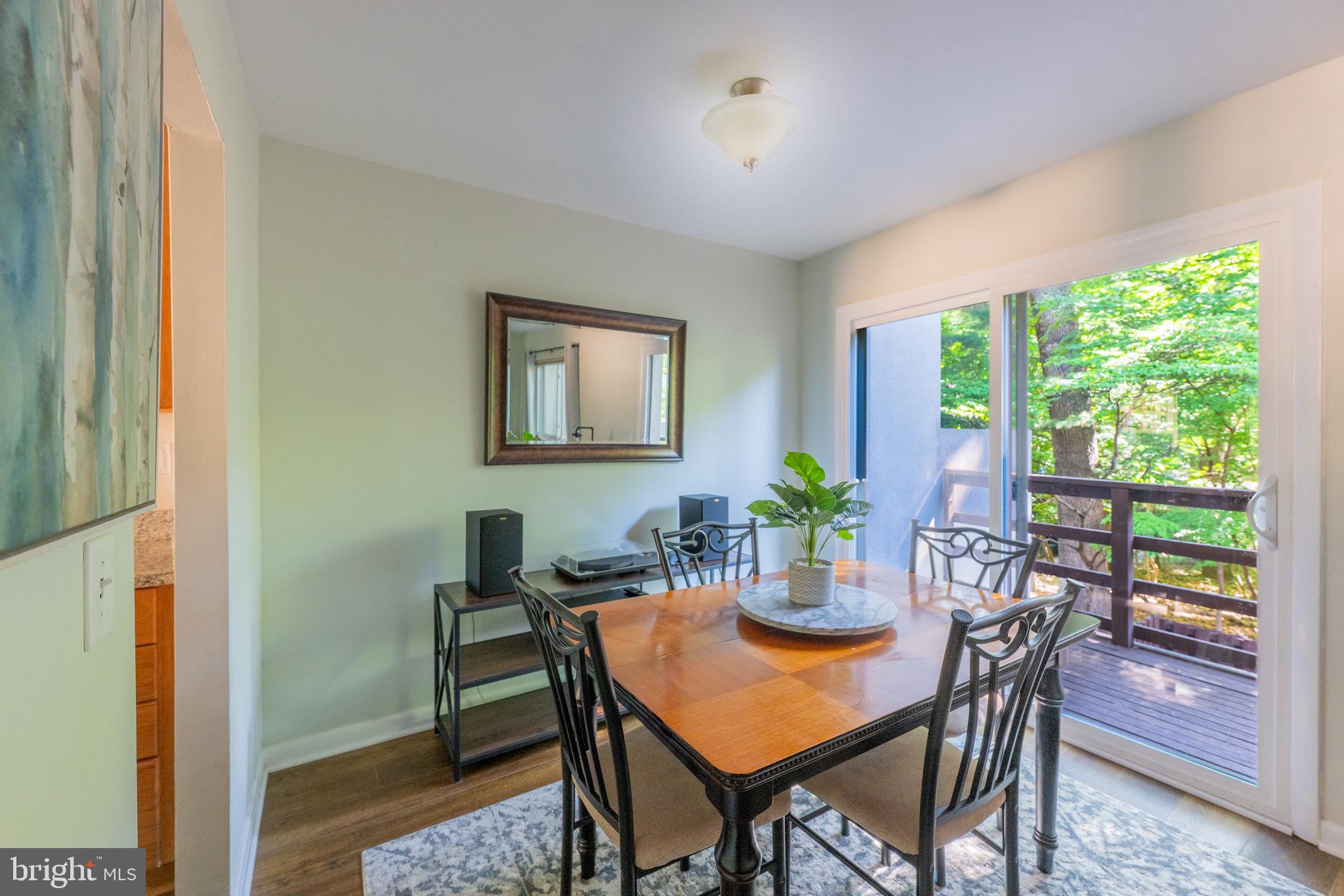 11917 Barrel Cooper Court Reston, VA 20191 - Photo 11 of 59 a view of a dining room with furniture window and outside view
