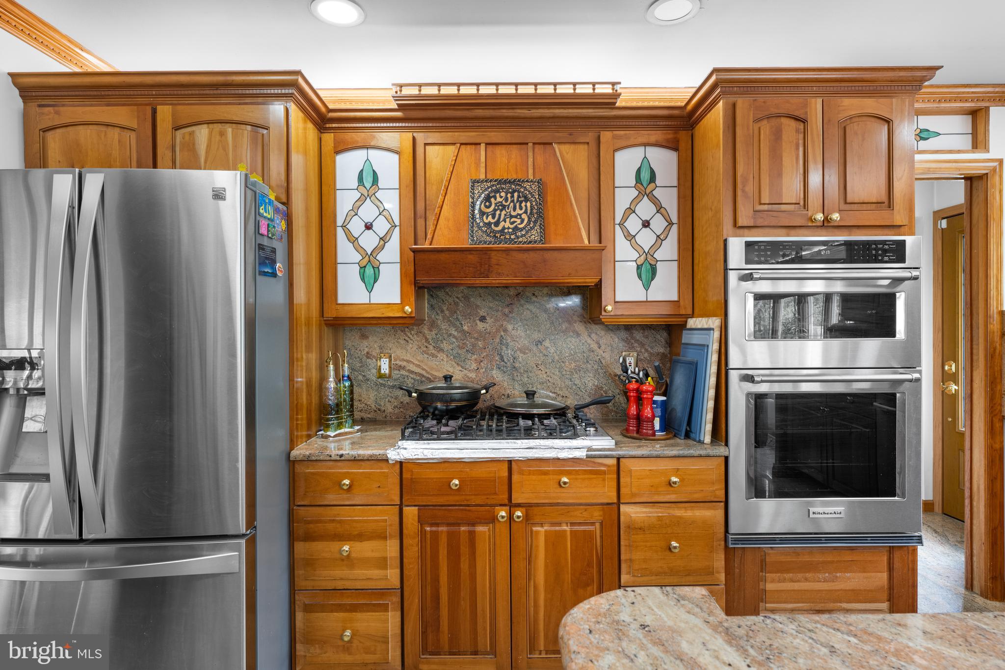 173 Butler Road Princeton, NJ 08540 - Photo 24 of 68 a kitchen with stainless steel appliances granite countertop a refrigerator and a stove top oven