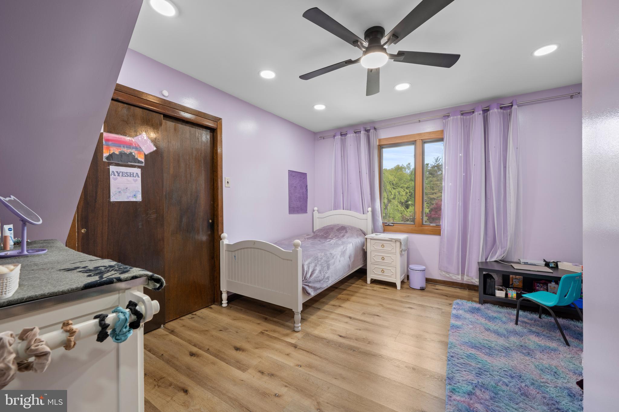 173 Butler Road Princeton, NJ 08540 - Photo 31 of 68 a spacious bedroom with a bed and a chandelier