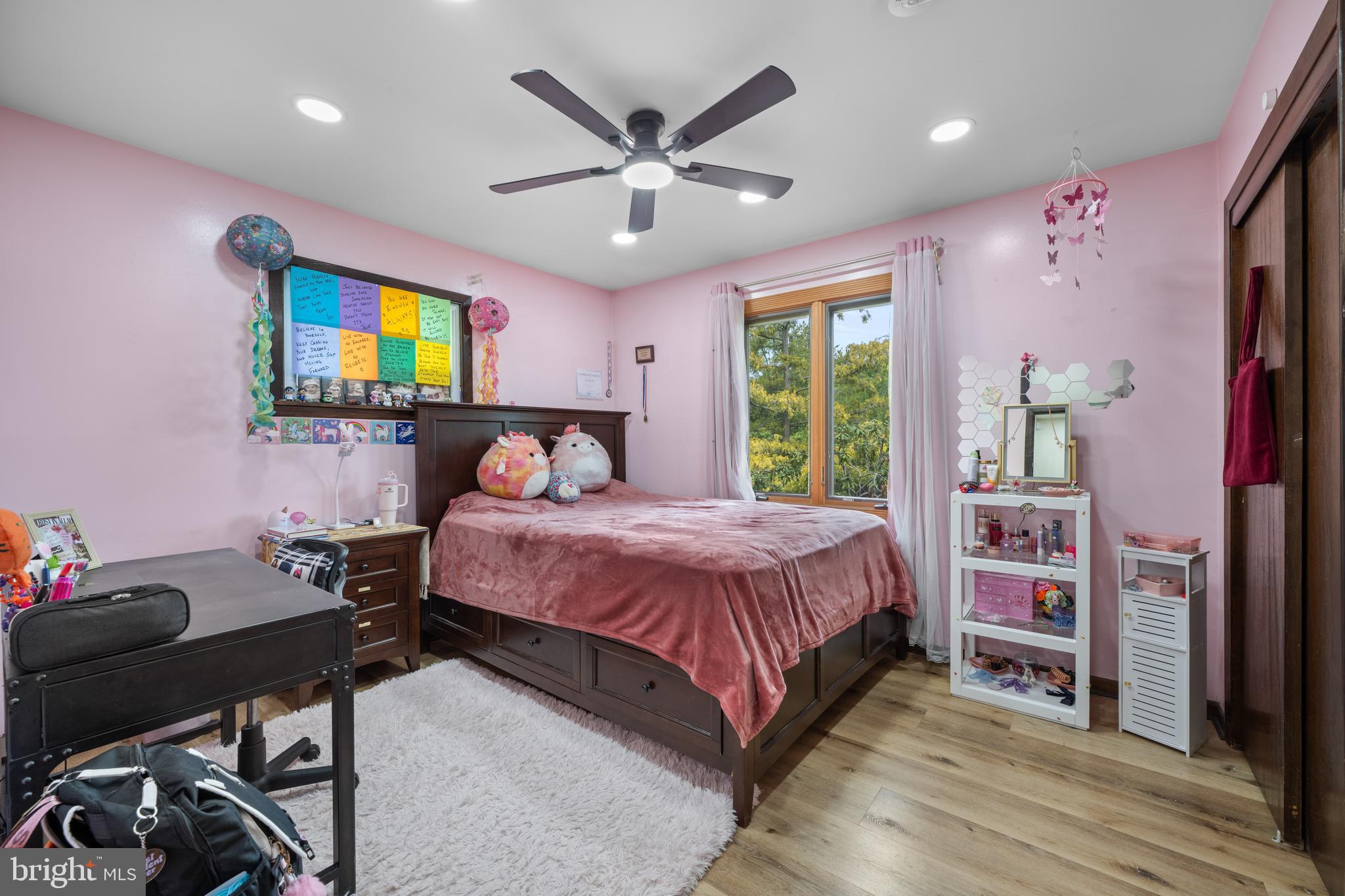 173 Butler Road Princeton, NJ 08540 - Photo 32 of 68 a bedroom with a bed and a flat screen tv
