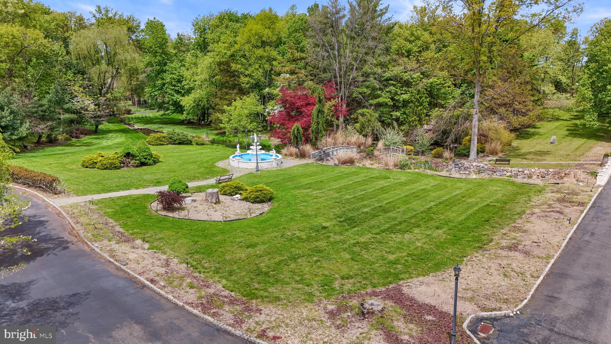 173 Butler Road Princeton, NJ 08540 - Photo 52 of 68 a view of a play ground in front of a house