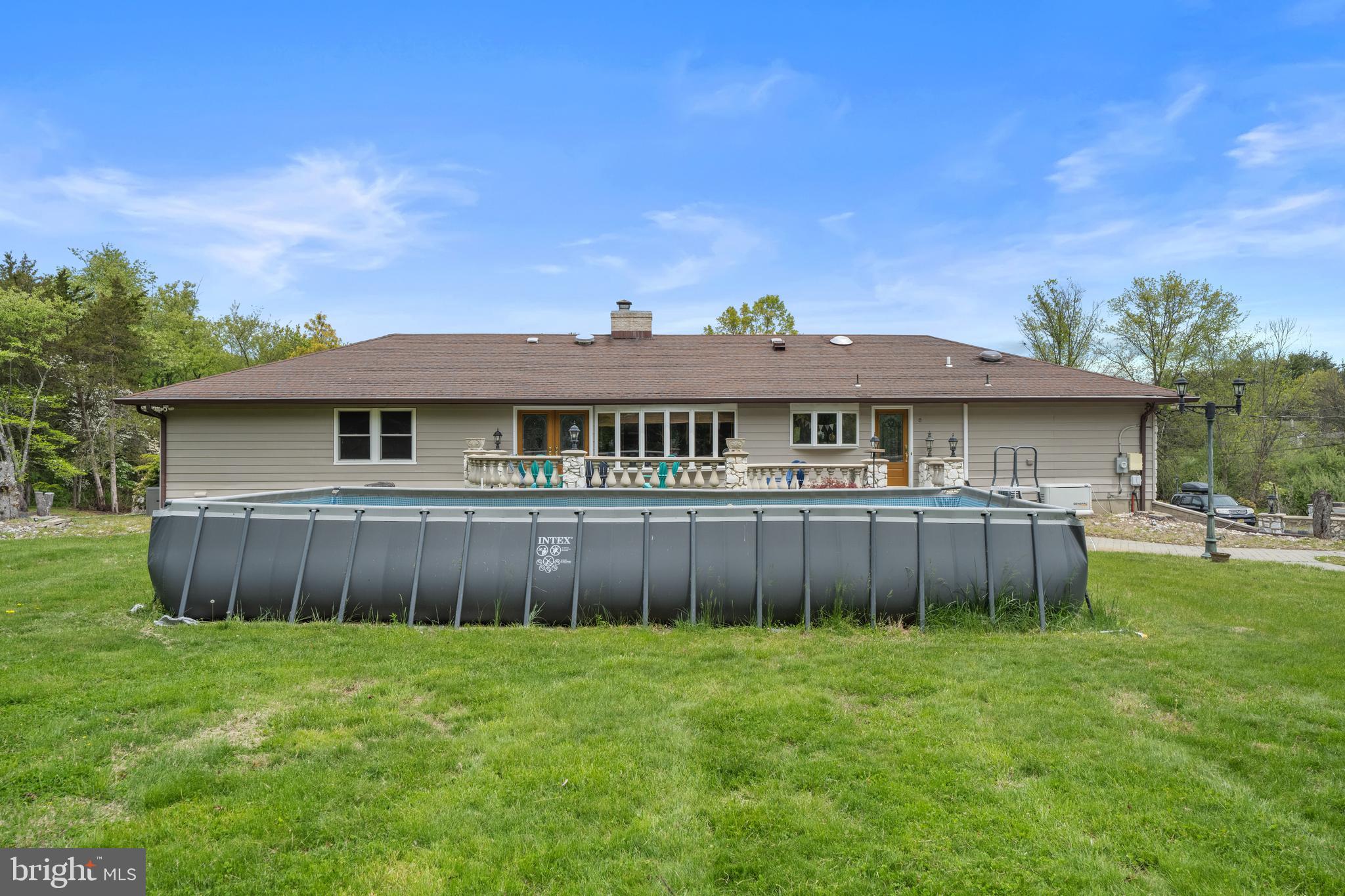 173 Butler Road Princeton, NJ 08540 - Photo 56 of 68 a front view of a house with a yard