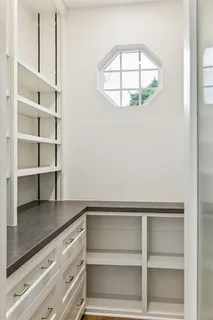 a view of a dining room with furniture wooden floor and chandelier