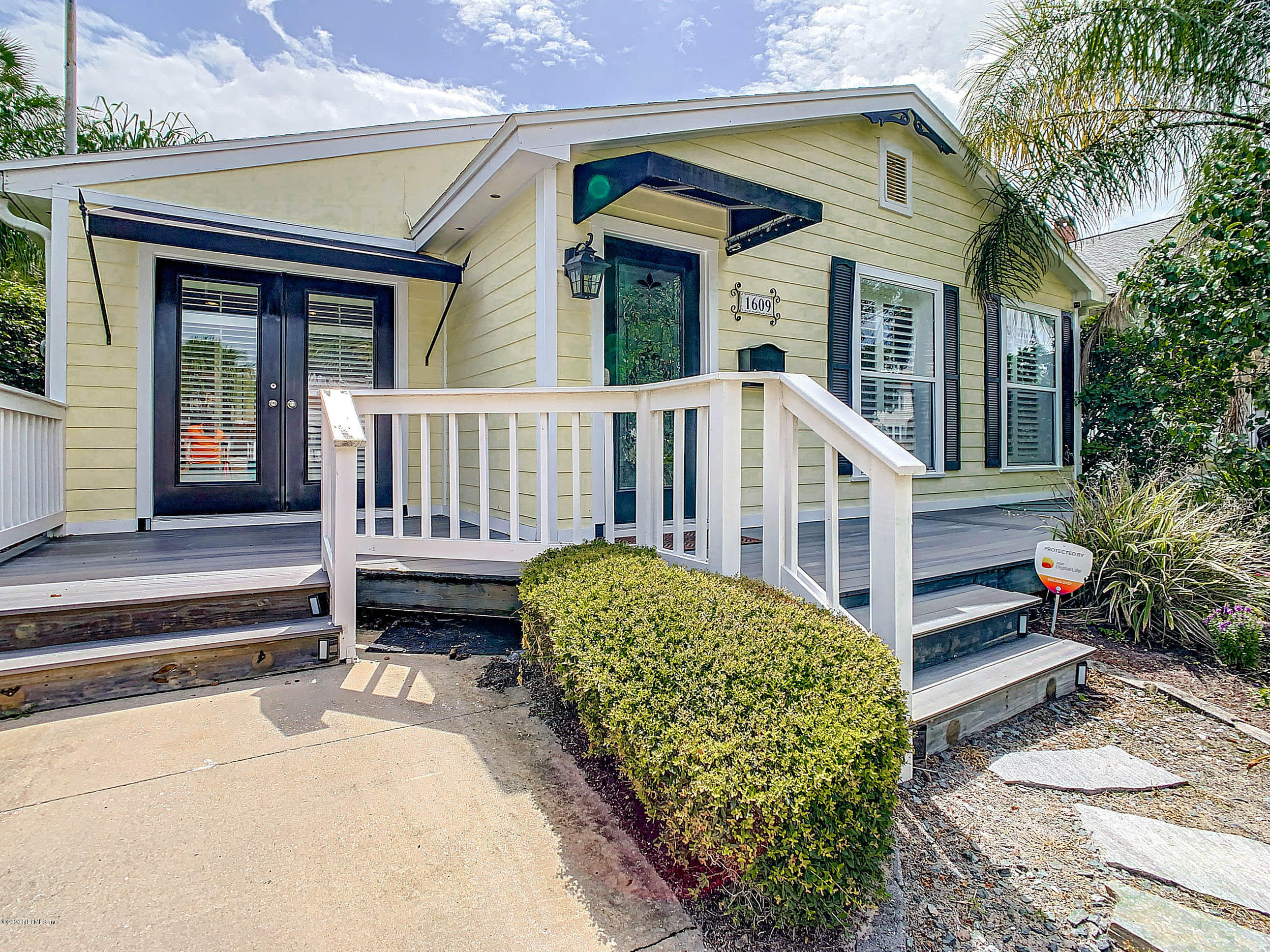 1609 First Street Neptune Beach, FL 32266 - Photo 1 of 30 front view of a house with a yard