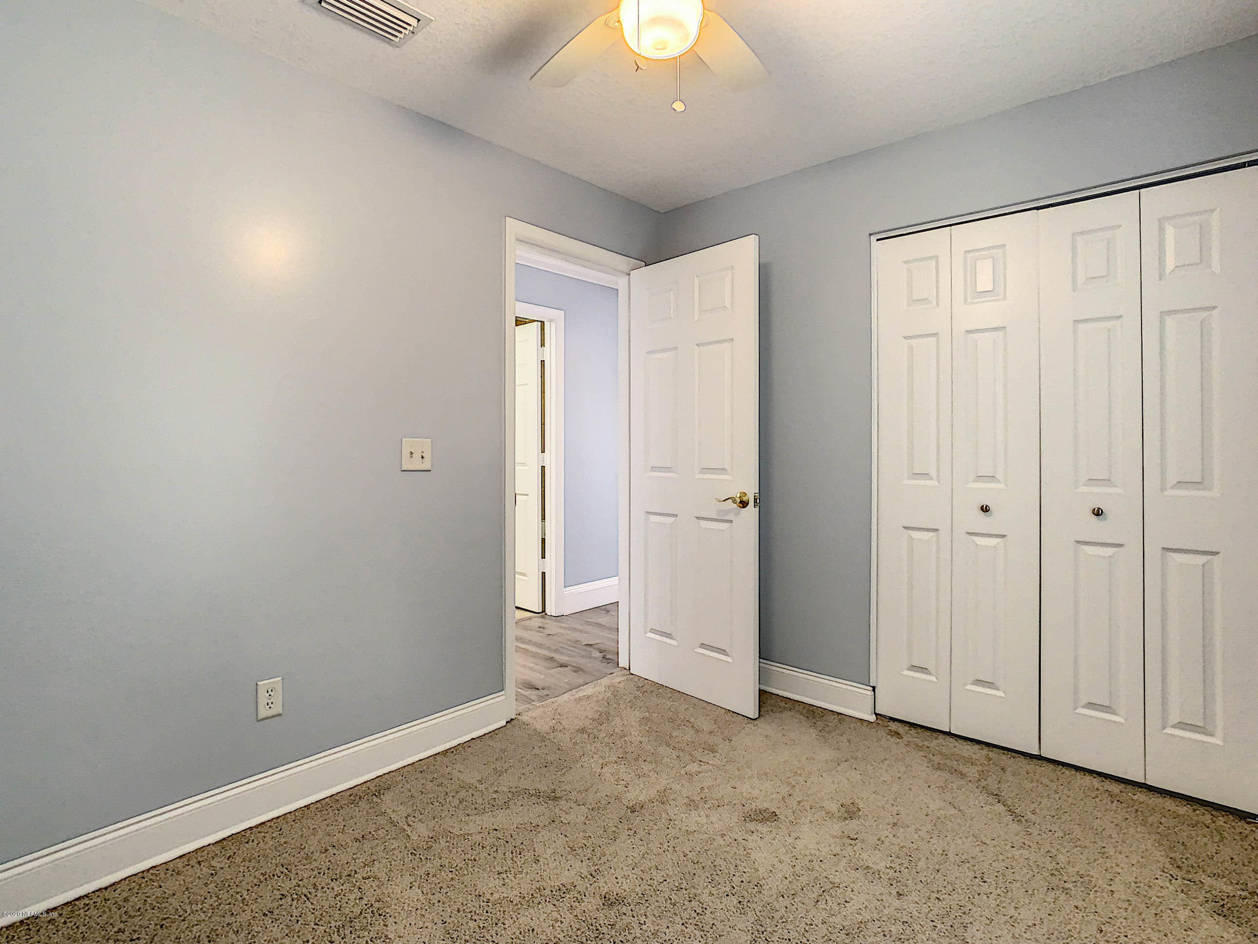 1609 First Street Neptune Beach, FL 32266 - Photo 12 of 30 an empty room with a empty space and a window