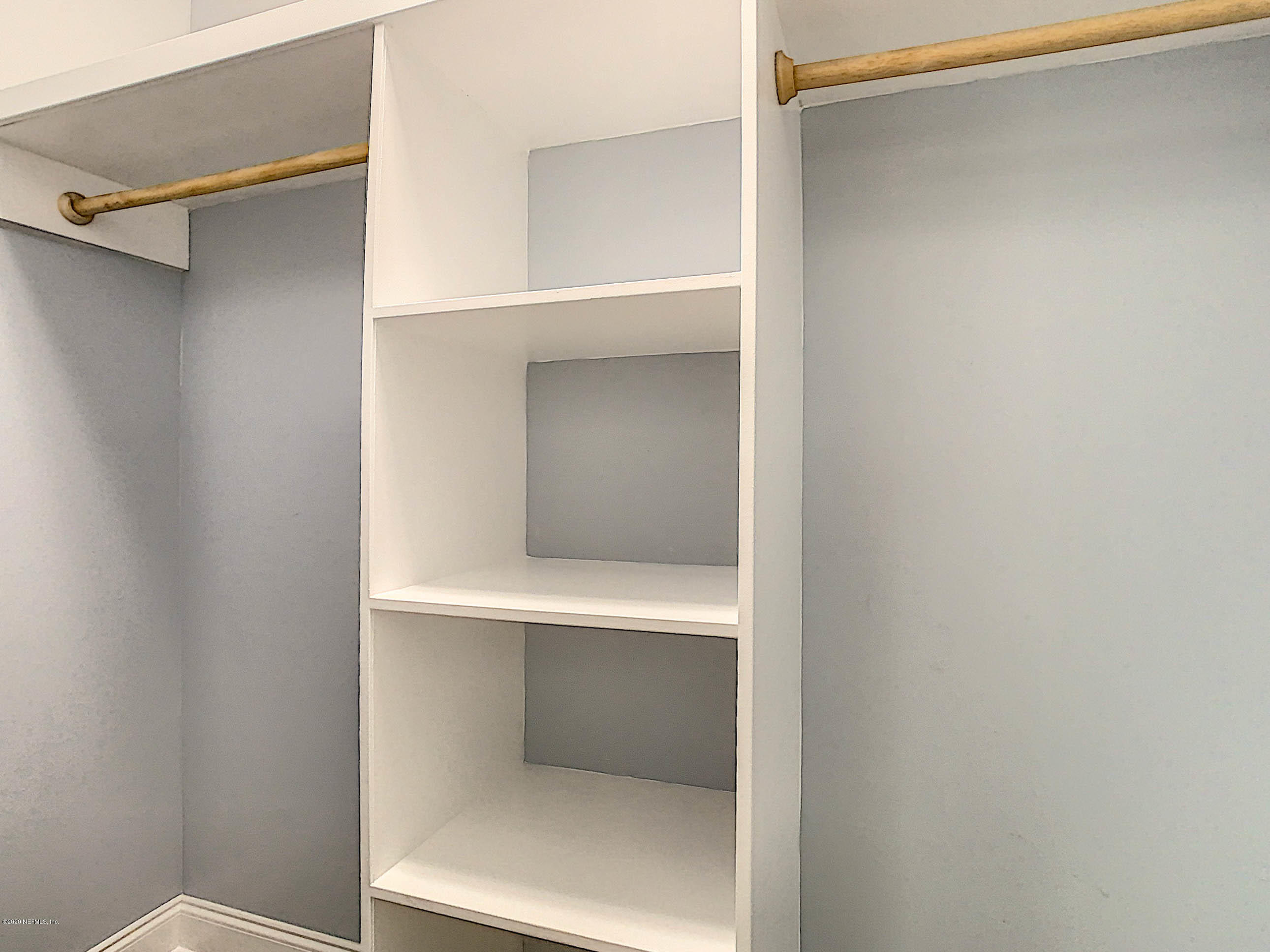 1609 First Street Neptune Beach, FL 32266 - Photo 22 of 30 a view of an empty walk in closet
