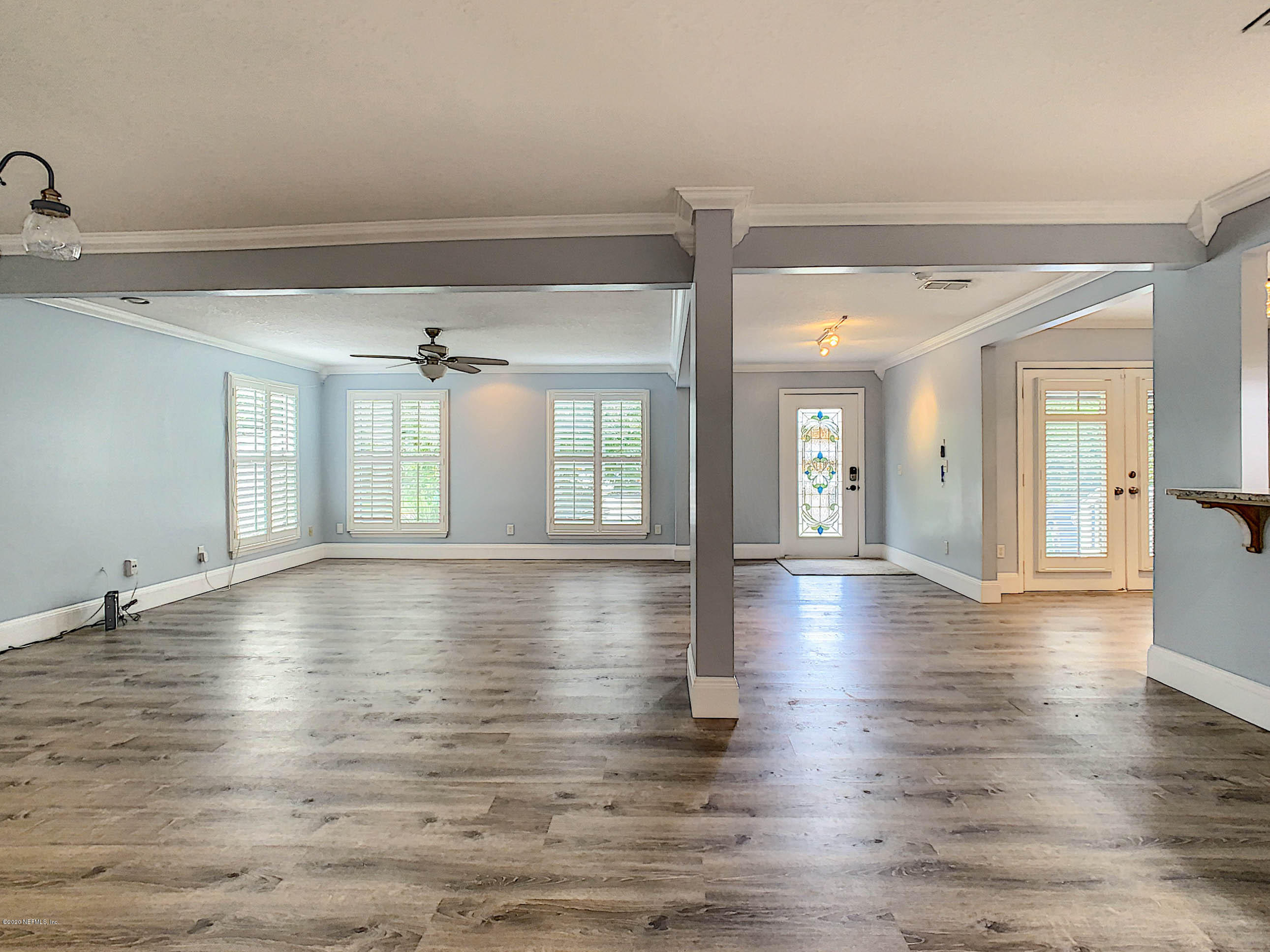 1609 First Street Neptune Beach, FL 32266 - Photo 6 of 30 a view of livingroom with hardwood floor and hallway