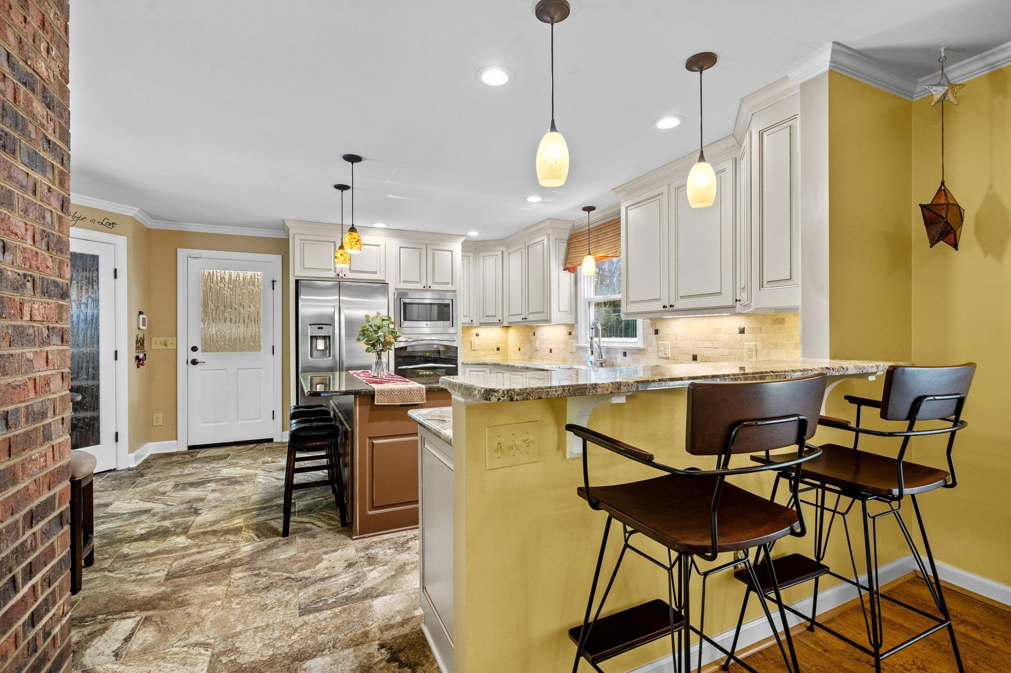 301 Graham Day Road Roxboro, NC 27574 - Photo 10 of 66 Bar seating and renovated kitchen