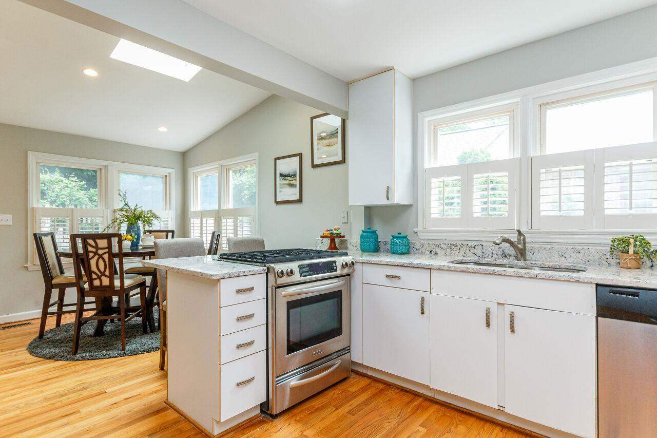 3018 Medlin Drive Raleigh, NC 27607 - Photo 13 of 30 Light and bright kitchen opens up to a dining area. Great skylights and windows give this home a wonderful bright look Kitchen