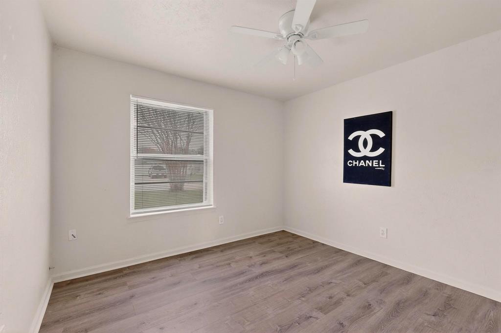 1538 Oakbrook Street Lancaster, TX 75134 - Photo 15 of 34 an empty room with a window