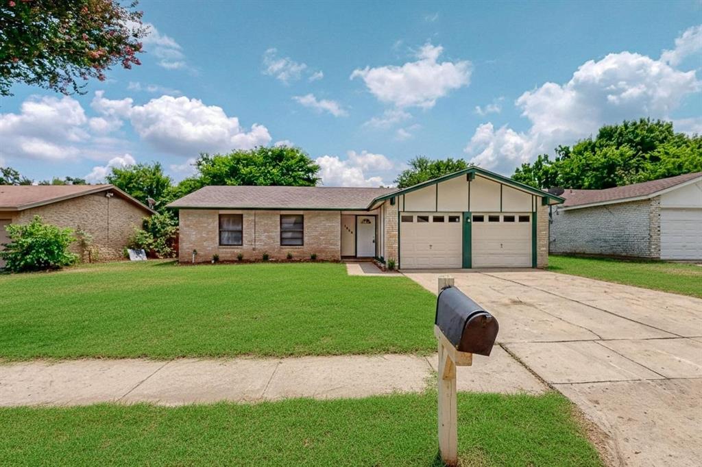1538 Oakbrook Street Lancaster, TX 75134 - Photo 31 of 34 a patio with table and chairs with wooden fence