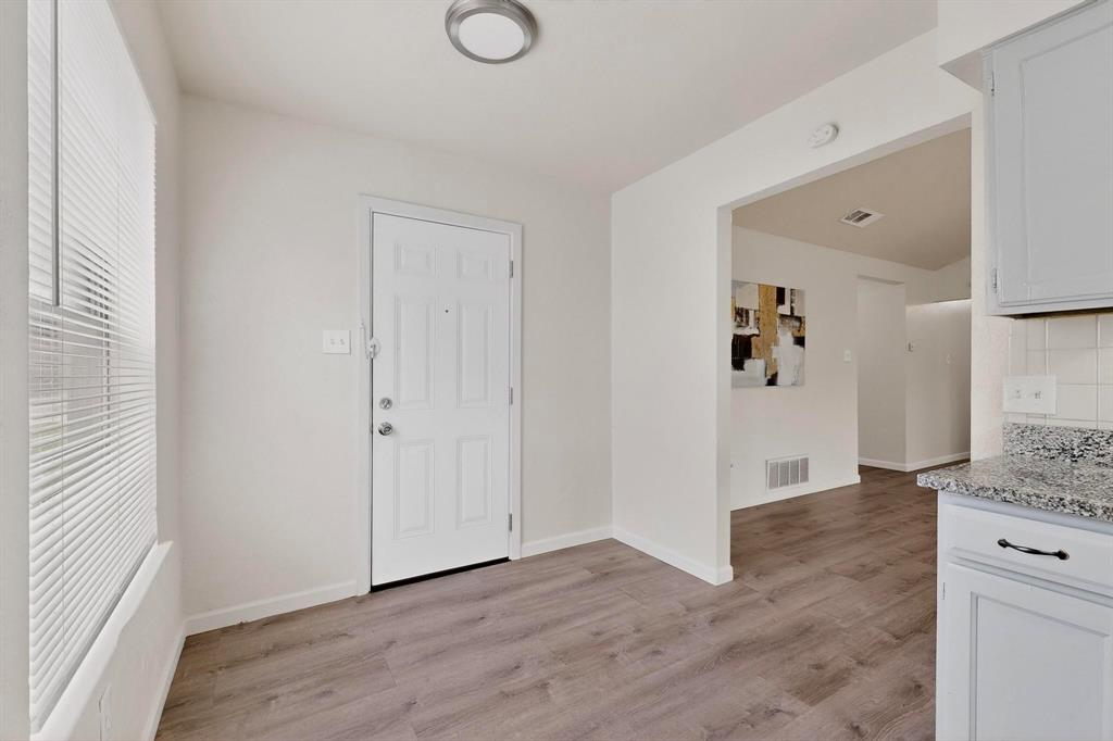1538 Oakbrook Street Lancaster, TX 75134 - Photo 6 of 34 a view of livingroom with wooden floor