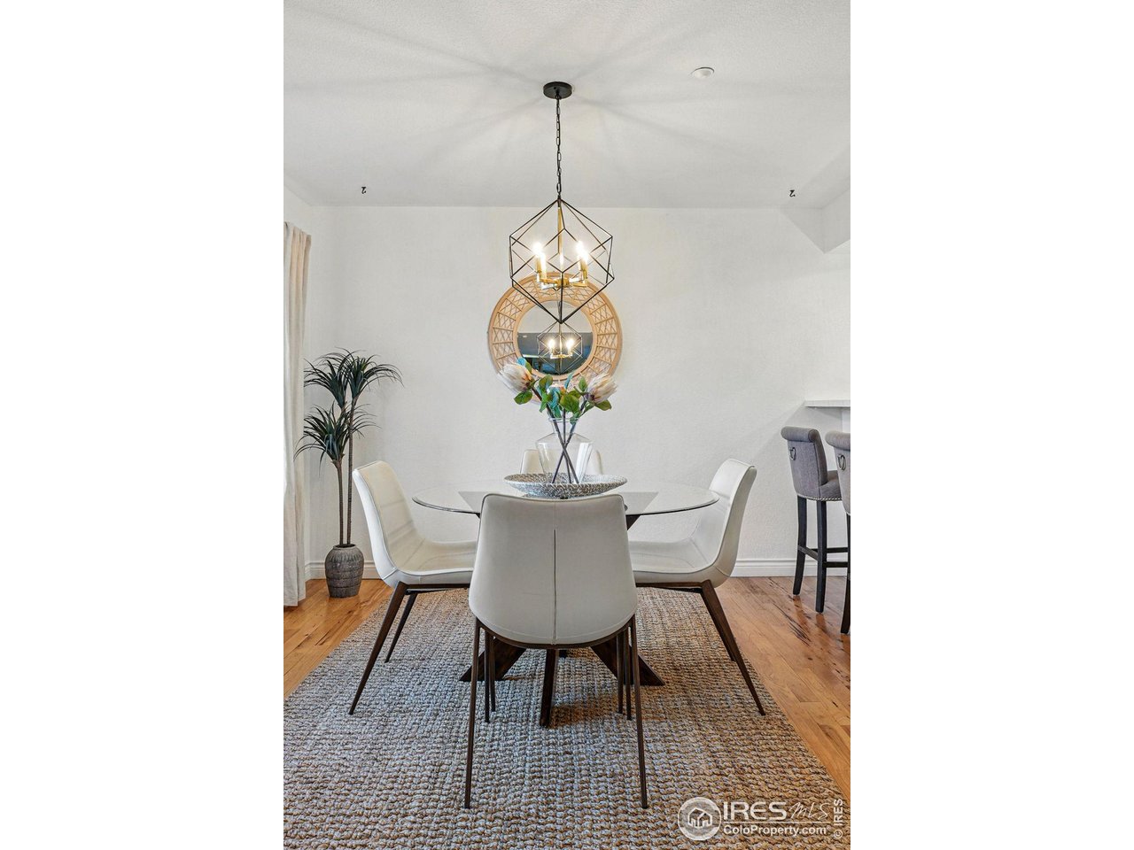 2700 Valmont Road, Unit 5 Boulder, CO 80304 - Photo 11 of 35 a dining room with a table and chairs