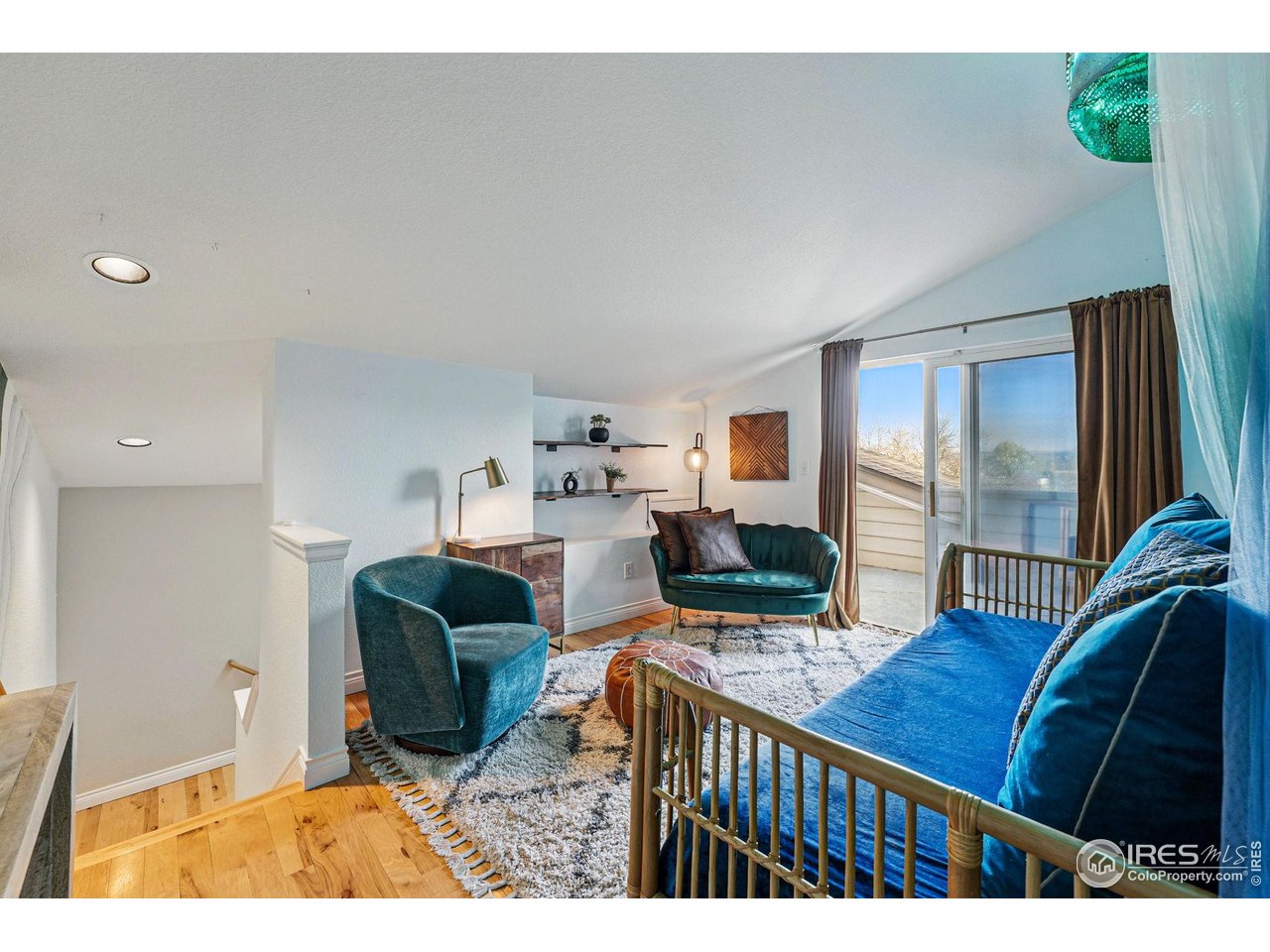 2700 Valmont Road, Unit 5 Boulder, CO 80304 - Photo 24 of 35 a living room with furniture and a wooden floor