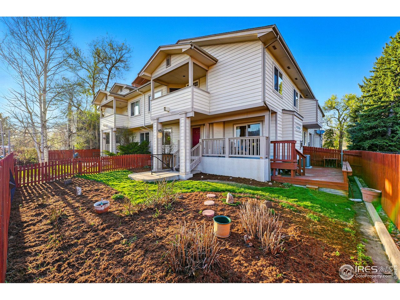 2700 Valmont Road, Unit 5 Boulder, CO 80304 - Photo 29 of 35 a view of a house with a yard