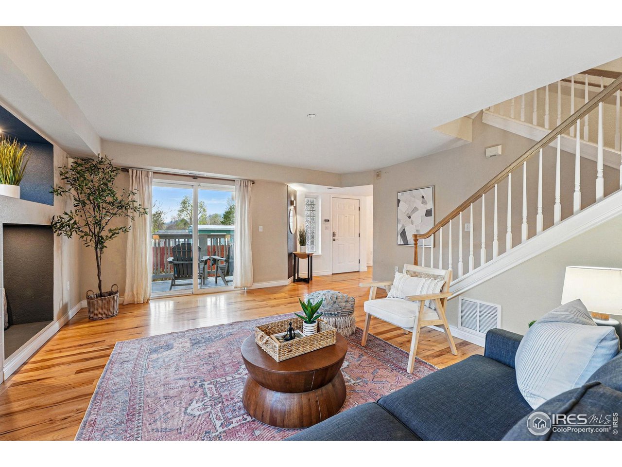 2700 Valmont Road, Unit 5 Boulder, CO 80304 - Photo 4 of 35 a living room with furniture and a large window