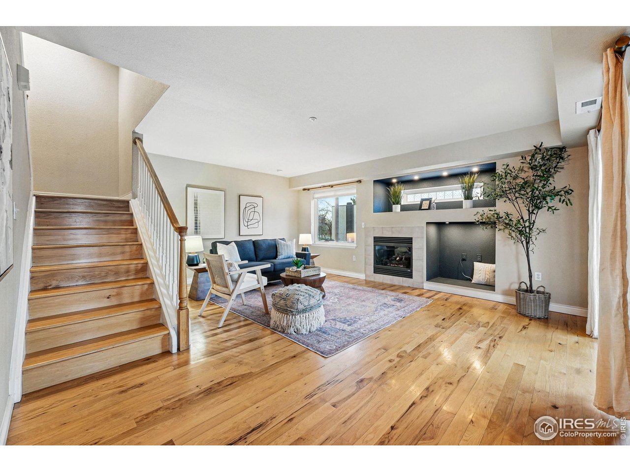 2700 Valmont Road, Unit 5 Boulder, CO 80304 - Photo 6 of 35 a living room with furniture and a fireplace