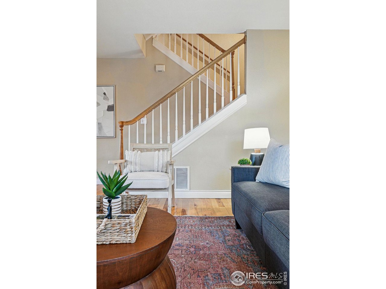 2700 Valmont Road, Unit 5 Boulder, CO 80304 - Photo 7 of 35 a living room with furniture and stairs