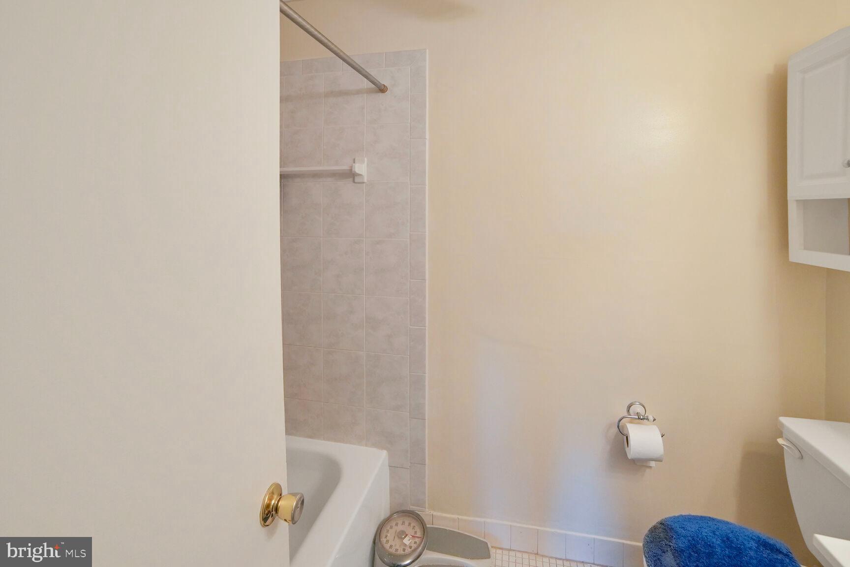 15708 Dorset Road, Unit 304 Laurel, MD 20707 - Photo 17 of 32 a bathroom with a shower