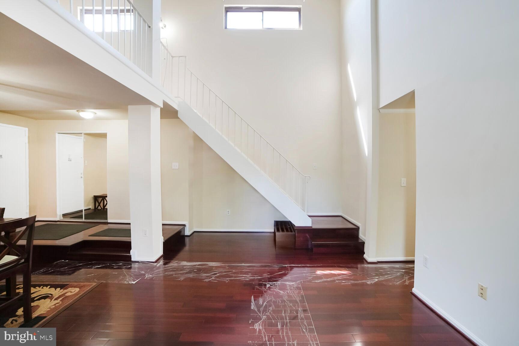 15708 Dorset Road, Unit 304 Laurel, MD 20707 - Photo 7 of 32 a view of entryway and hall with wooden floor