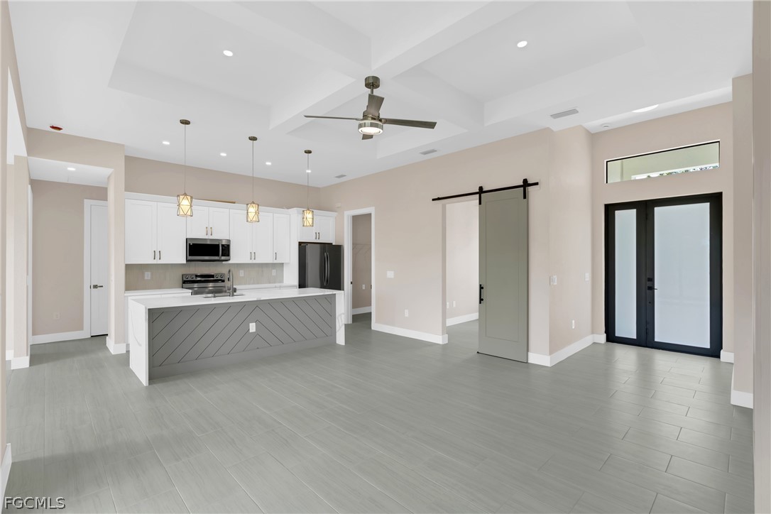 6029 Keystone Circle LaBelle, FL 33935 - Photo 9 of 50 a large space with a large window and stainless steel appliances