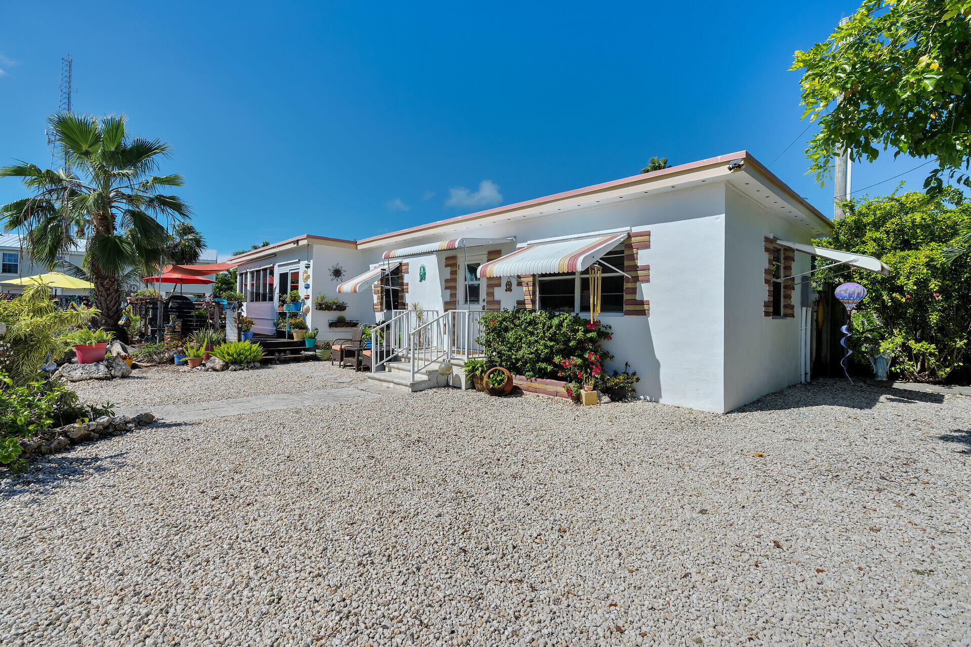a view of a house with a street and a garage
