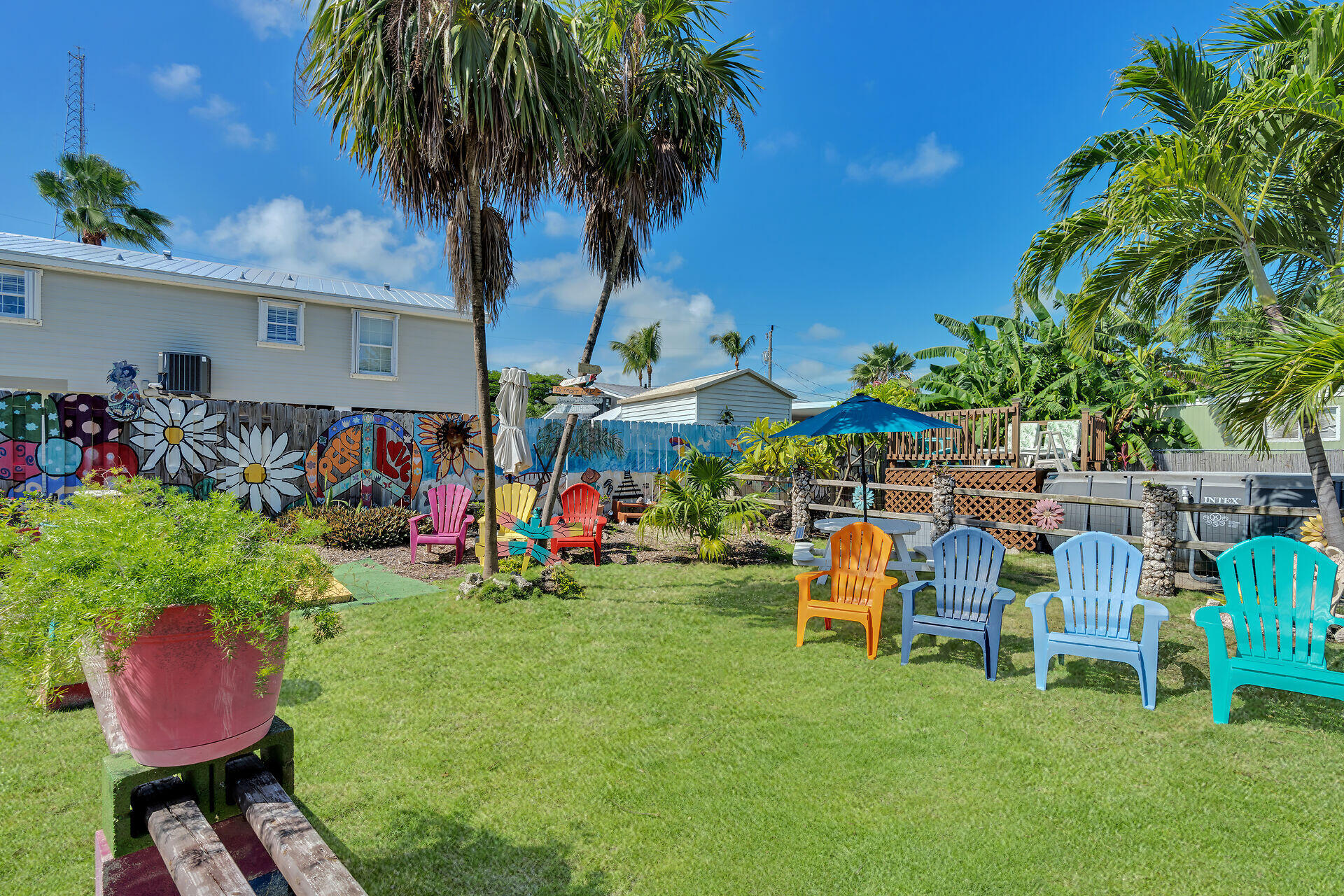 357 23rd Street Marathon, FL 33050 - Photo 14 of 48 a group of chairs sitting in patio area of a house