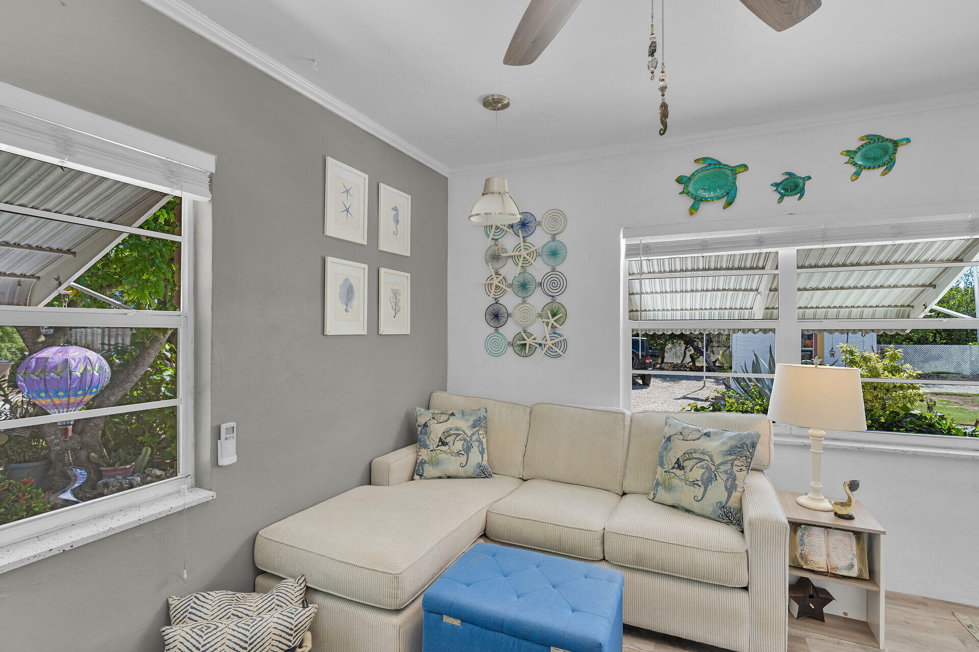 357 23rd Street Marathon, FL 33050 - Photo 20 of 48 a living room with furniture a table and a large window