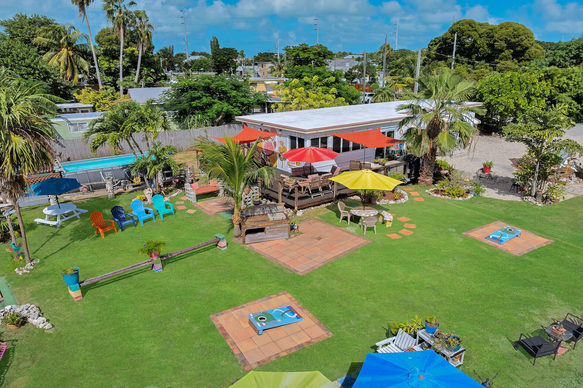 357 23rd Street Marathon, FL 33050 - Photo 2 of 48 an aerial view of a play ground and tree s