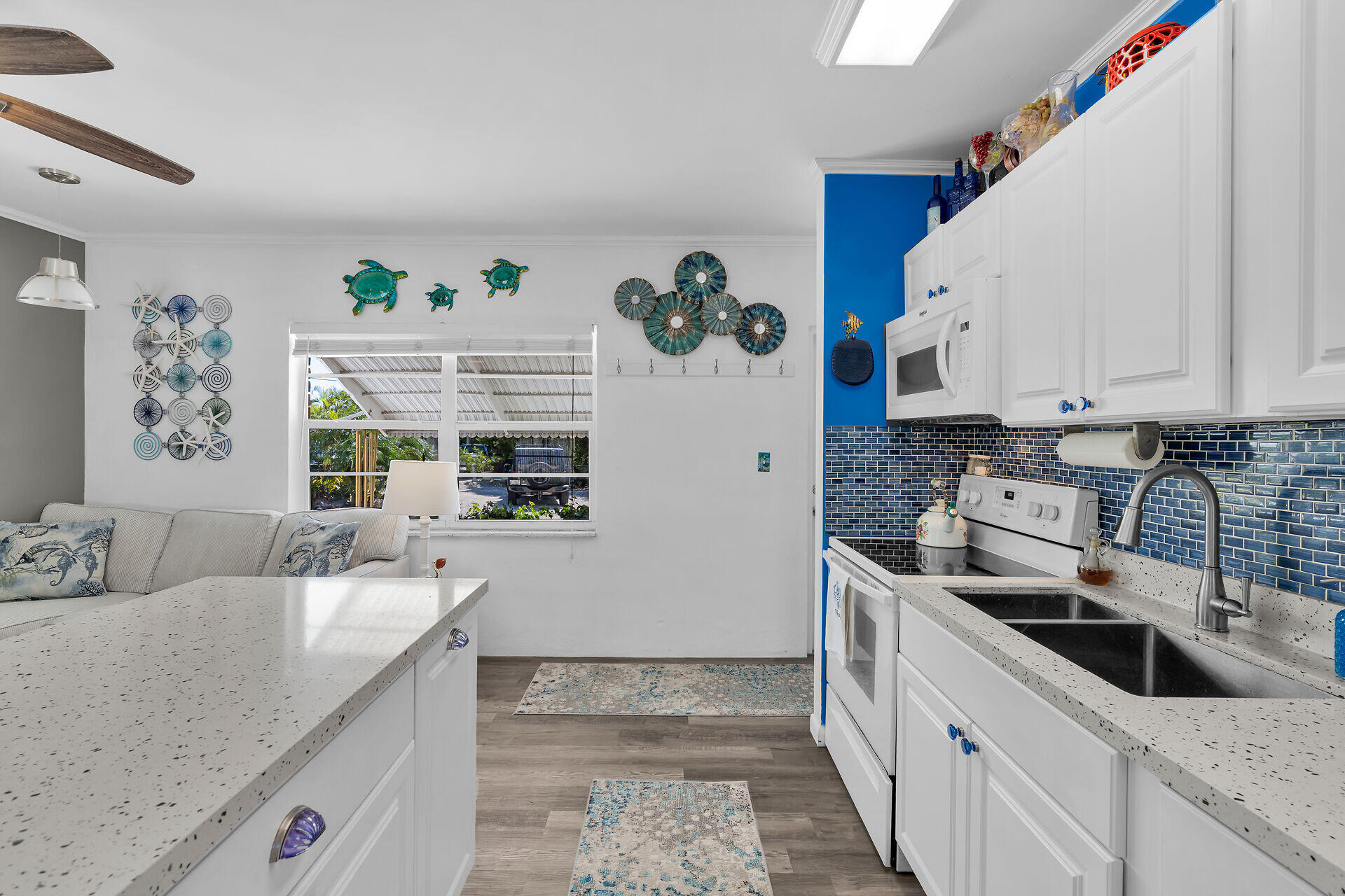 357 23rd Street Marathon, FL 33050 - Photo 21 of 48 a kitchen with granite countertop a sink a stove and cabinets