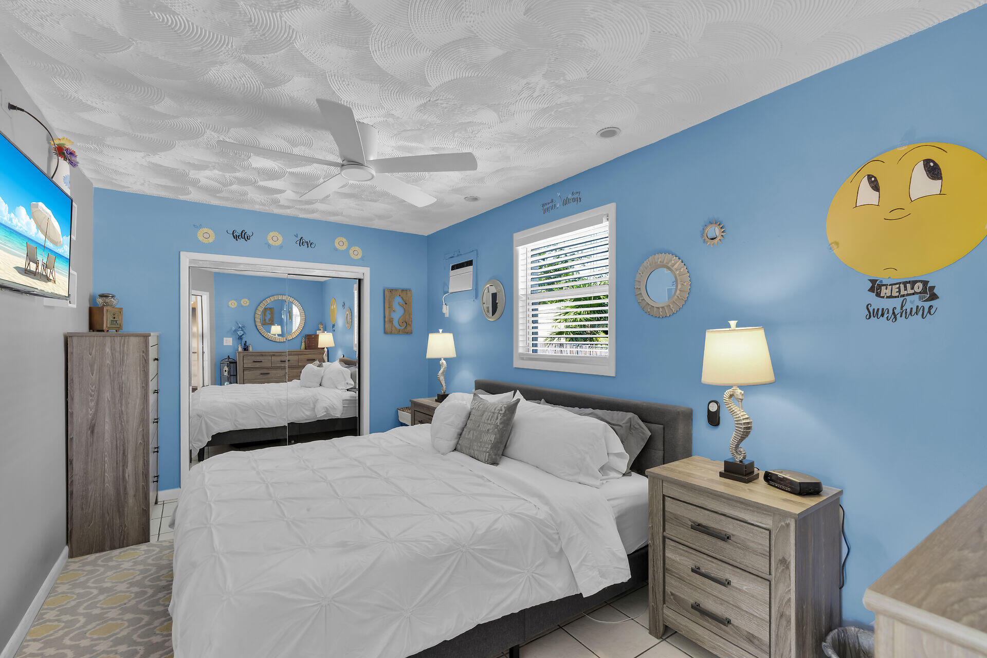 357 23rd Street Marathon, FL 33050 - Photo 25 of 48 a bedroom with a bed and a chandelier