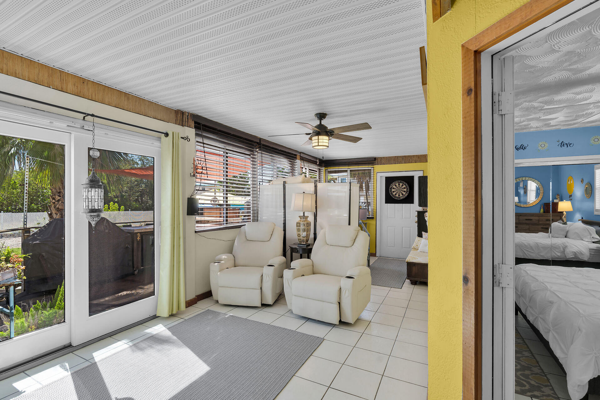 357 23rd Street Marathon, FL 33050 - Photo 28 of 48 a living room with furniture and a floor to ceiling window