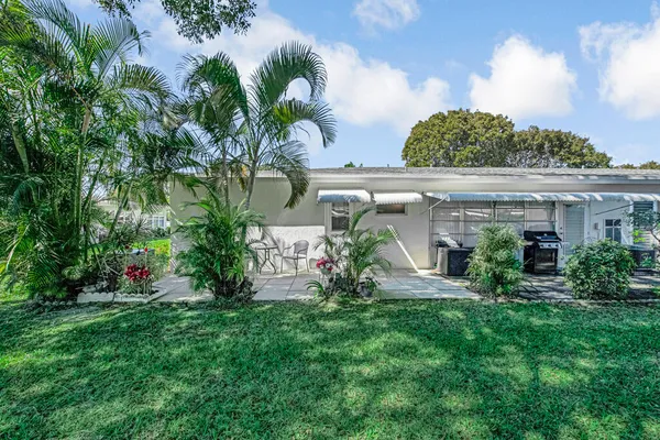 a view of a backyard with a garden