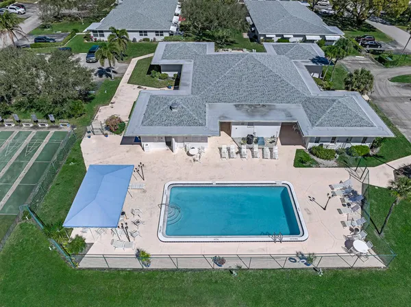 an aerial view of a house with garden
