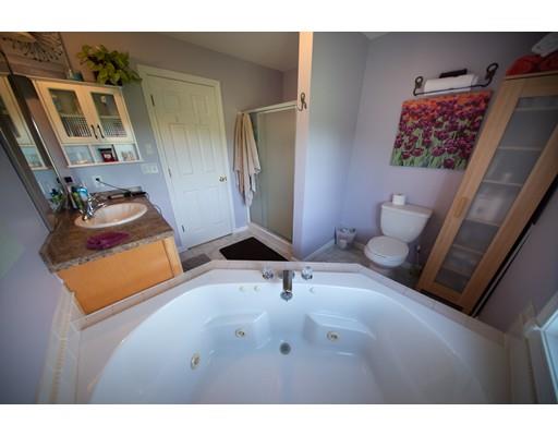 437 Ashby Road Ashburnham, MA 01430 - Photo 17 of 30 a bathroom with a sink and a mirror