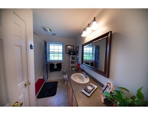 437 Ashby Road Ashburnham, MA 01430 - Photo 18 of 30 a living room with furniture and a flat screen tv