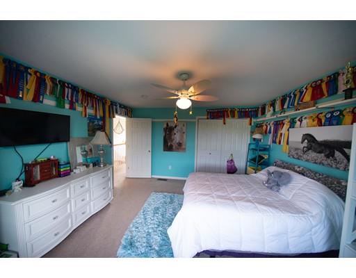 437 Ashby Road Ashburnham, MA 01430 - Photo 20 of 30 a bedroom with furniture and a book shelf